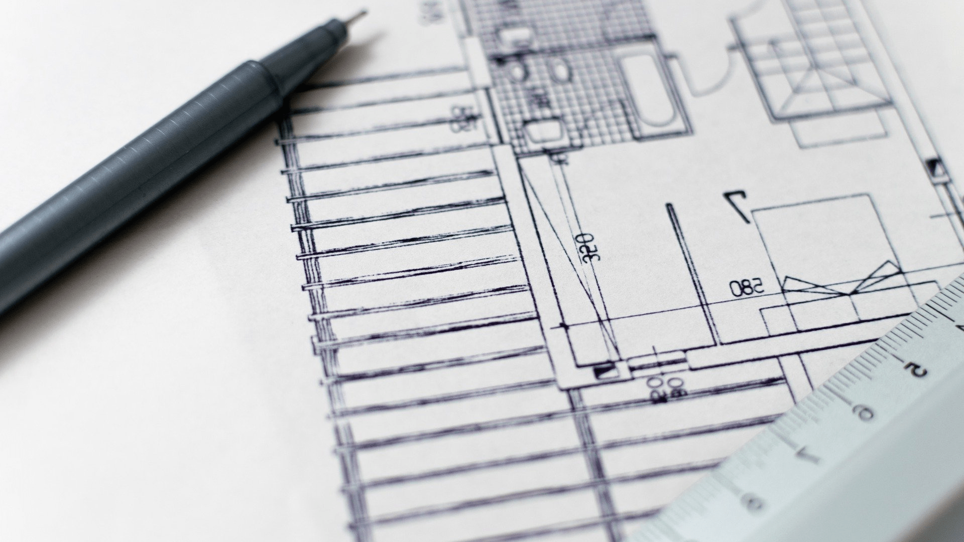 Close up of a floor plan drawing on a bit of paper